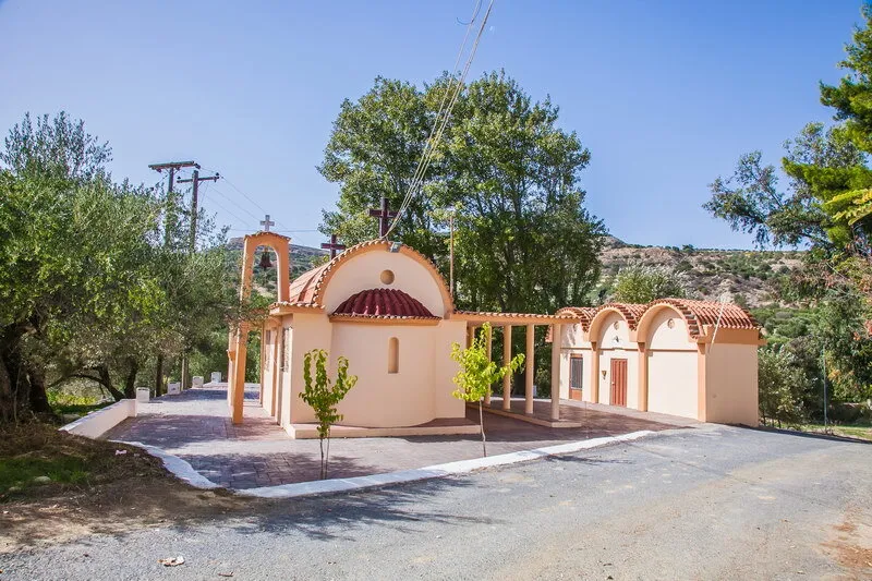 Partira: A Village Square with a Carved Fountain